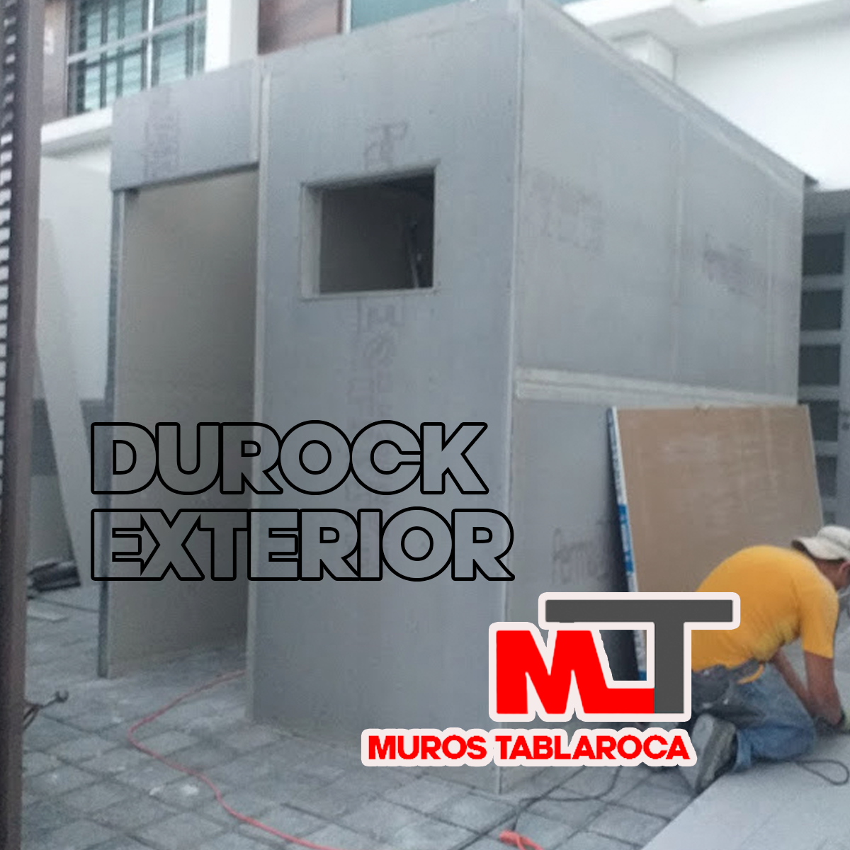 Taller construido con paneles de Durock en un estacionamiento en Puebla